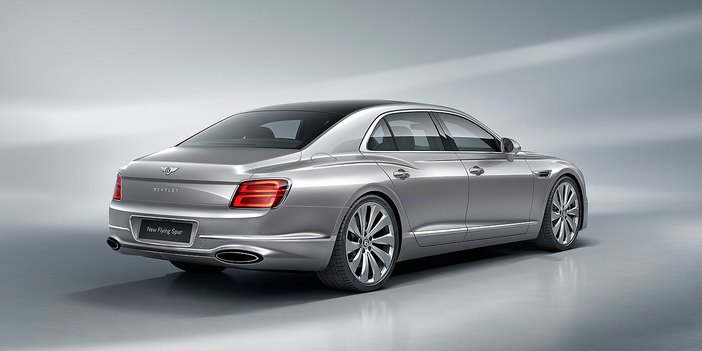 Bentley Casablanca New Bentley Flying Spur sedan rear view in Silverlake paint with ten spoke wheels and chrome matrix grille