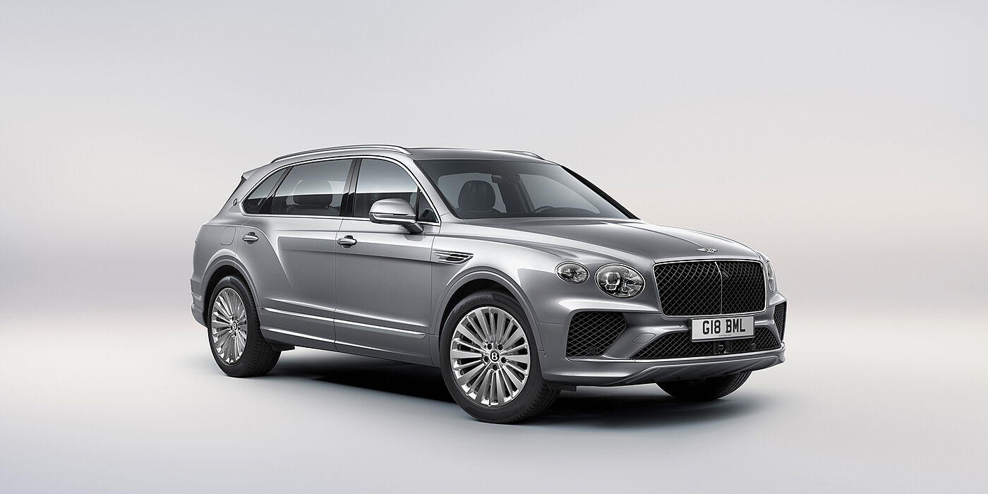 Bentley Casablanca Bentley Bentayga Extended Wheelbase luxury SUV front three quarter view in Moonbeam paint with 21 inch five spoke painted wheels