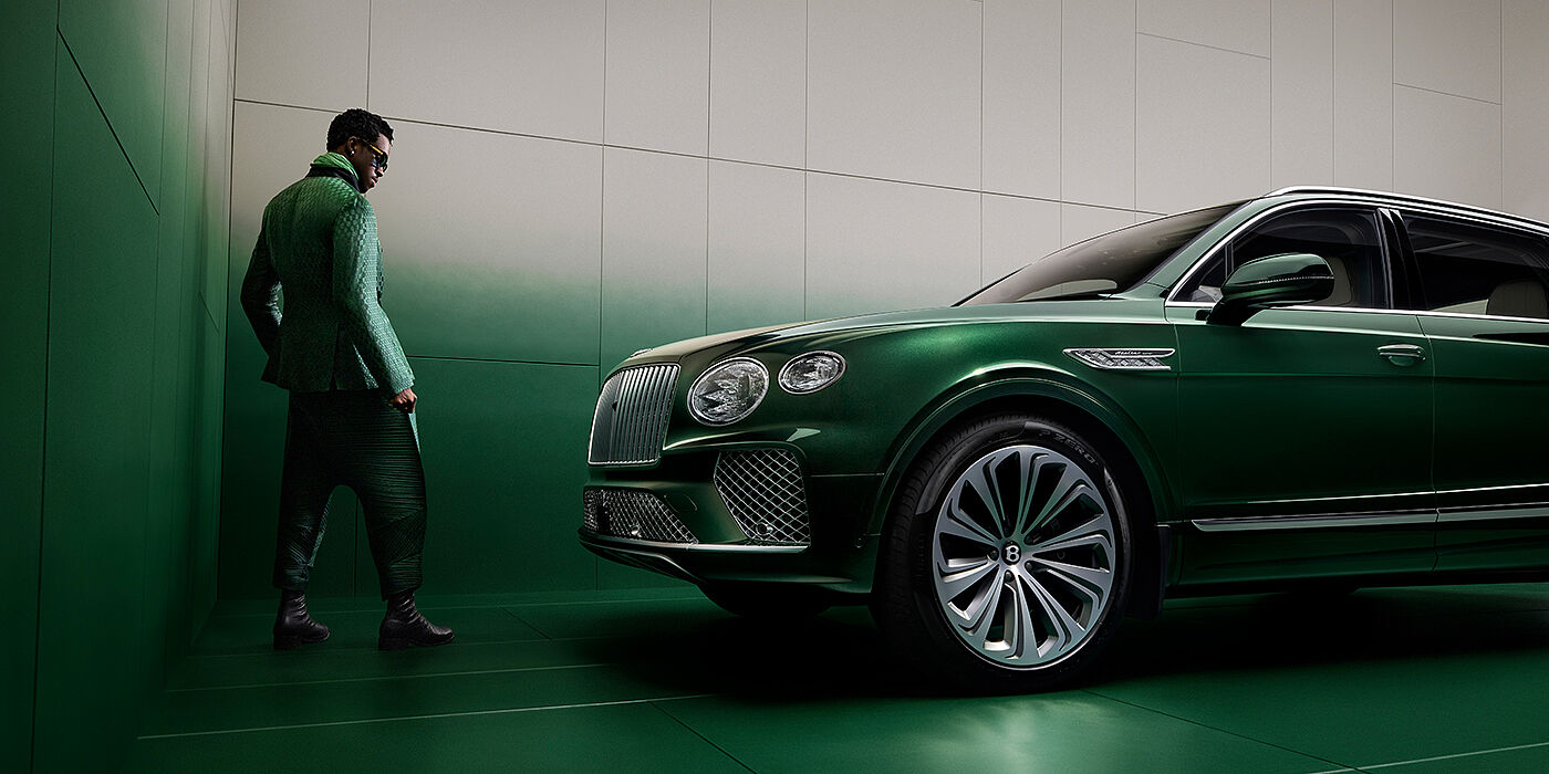 Bentley Casablanca Wisdom K standing next to Bentley Bentayga Extended Wheelbase SUV in Light Emerald green paint in profile