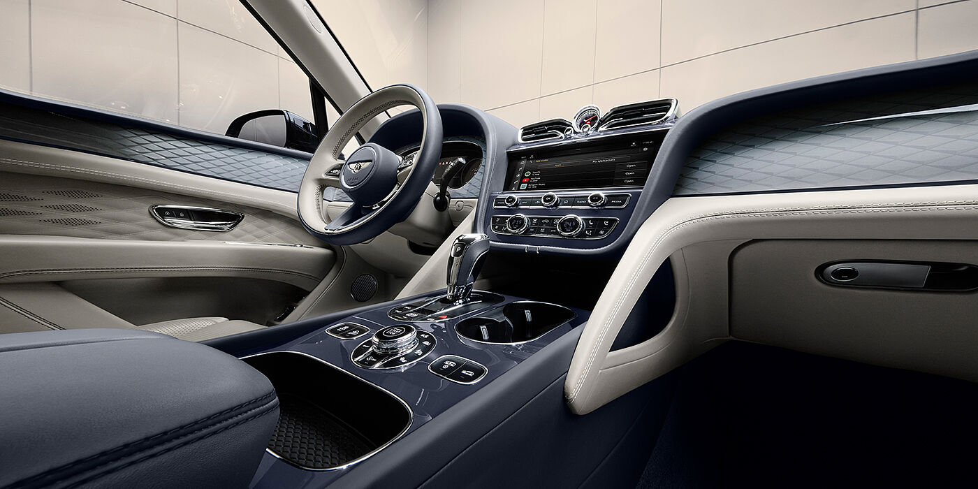 Bentley Casablanca Bentley Bentayga Atelier Edition SUV front interior in Linen and Imperial Blue hides with Dark Tint Diamond Brushed Aluminium veneer