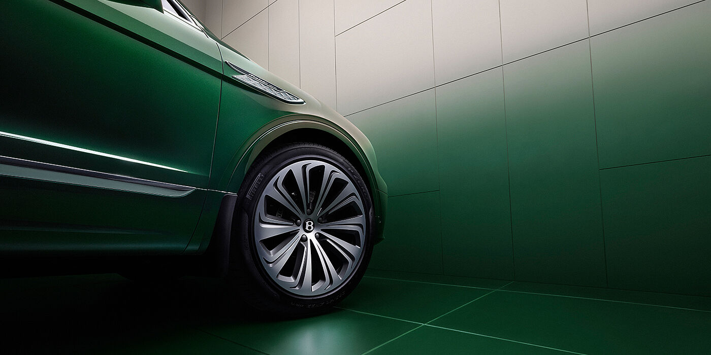 Bentley Casablanca Bentley Bentayga Extended Wheelbase Atelier Edition SUV in Light Emerald green paint front side detail with 22 inch 10 spoke wheel