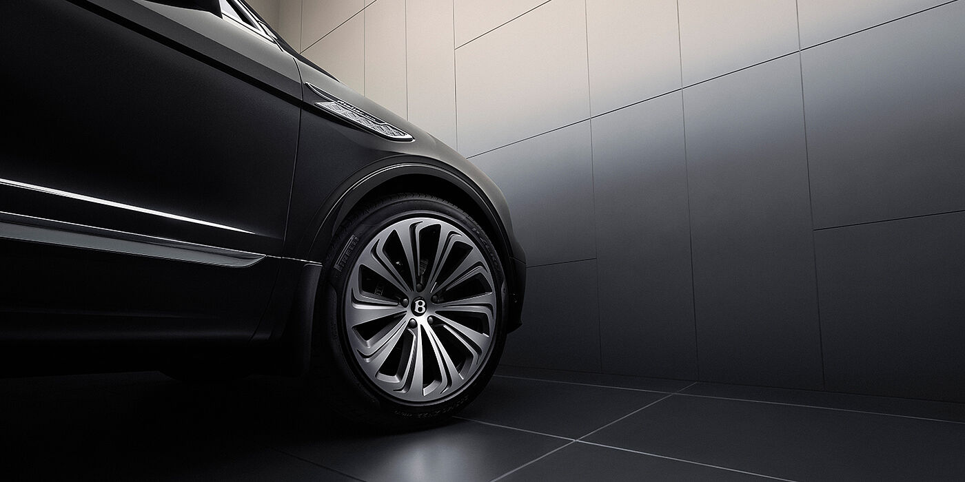 Bentley Casablanca Bentley Bentayga Atelier Edition SUV in Onyx black paint front side detail with 22 inch 10 spoke wheel