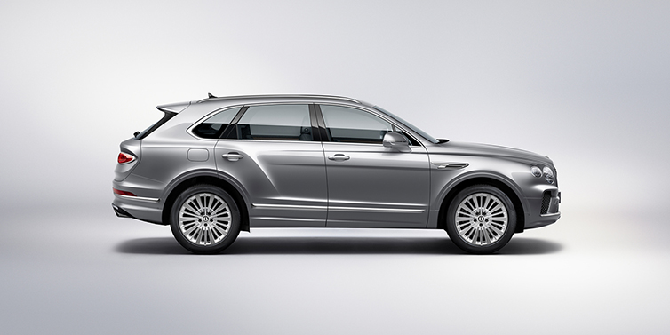 Bentley Casablanca Bentley Bentayga SUV side profile in Moonbeam silver paint against white background featuring 21 inch 5 spoke wheels