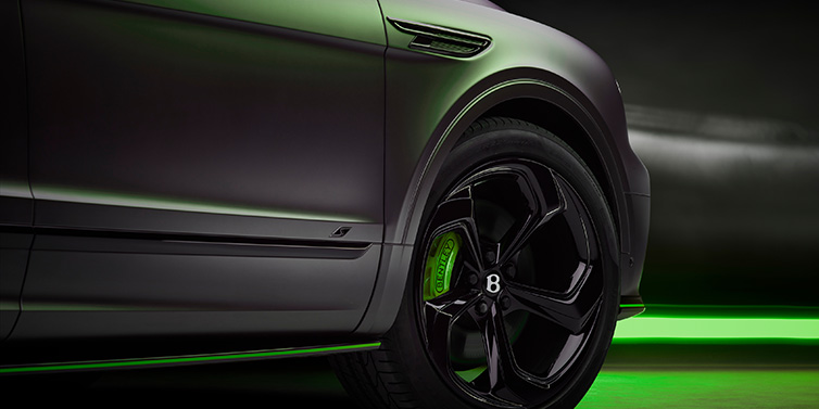 Bentley Casablanca Bentley Bentayga S Black Edition SUV exterior wheel detail with Cyber Green brakes with Anthracite Satin paint
