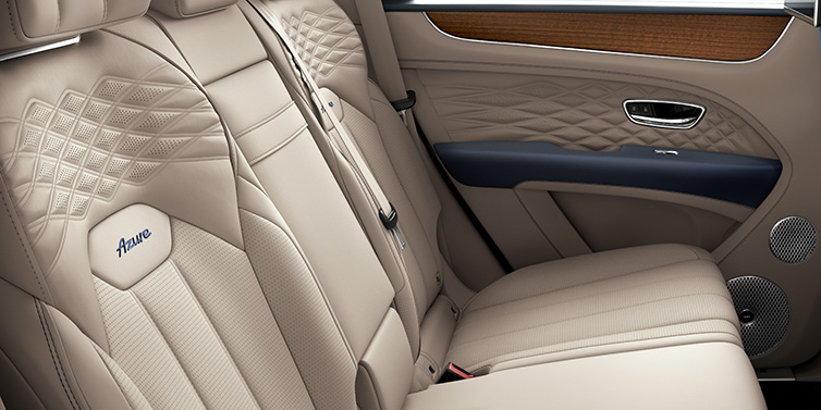 Bentley Casablanca Bentley Bentayga Azure SUV rear interior in Portland and Imperial Blue hides and seat stitching featuring Azure seat emblem
