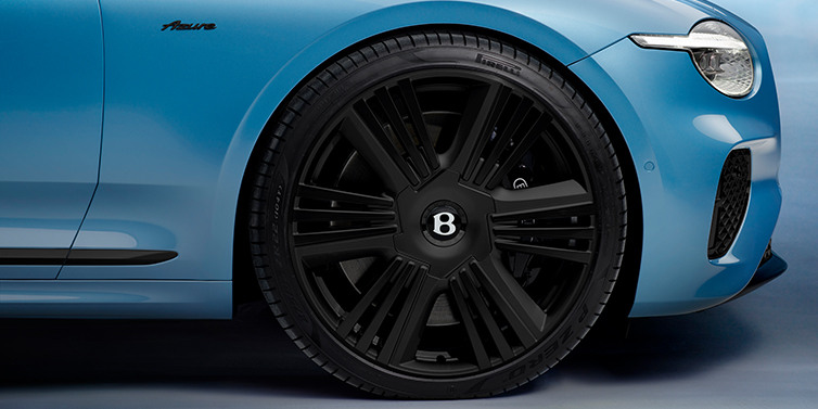 Bentley Casablanca New Bentley Continental GTC Azure convertible front wheel detail with 22 inch black ten spoke wheel and dark chrome details against Light Windsor blue paint