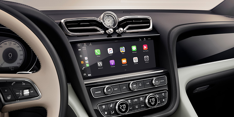 Bentley Casablanca Bentley Bentayga Extended Wheelbase Mulliner SUV front interior centre console with MMI screen showing Apps surrounded by Linen and Beluga black hide