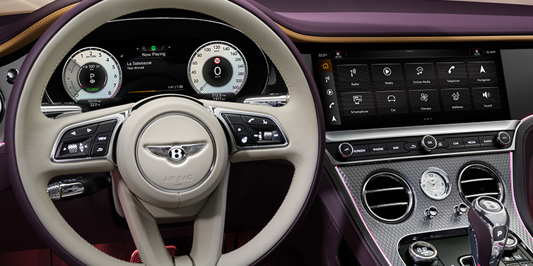 Bentley Casablanca Bentley Continental GTC Mulliner convertible steering wheel and drivers screens surrounded by Damson purple and Linen hides